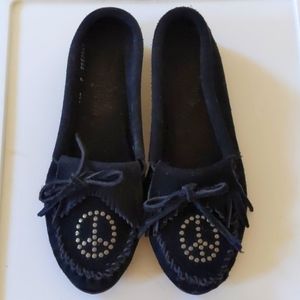 Black moccasins with peace sign